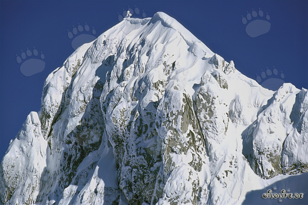 Snow-covered Westliche Karwendelspitze in Mittenwald, Bavaria, Germany