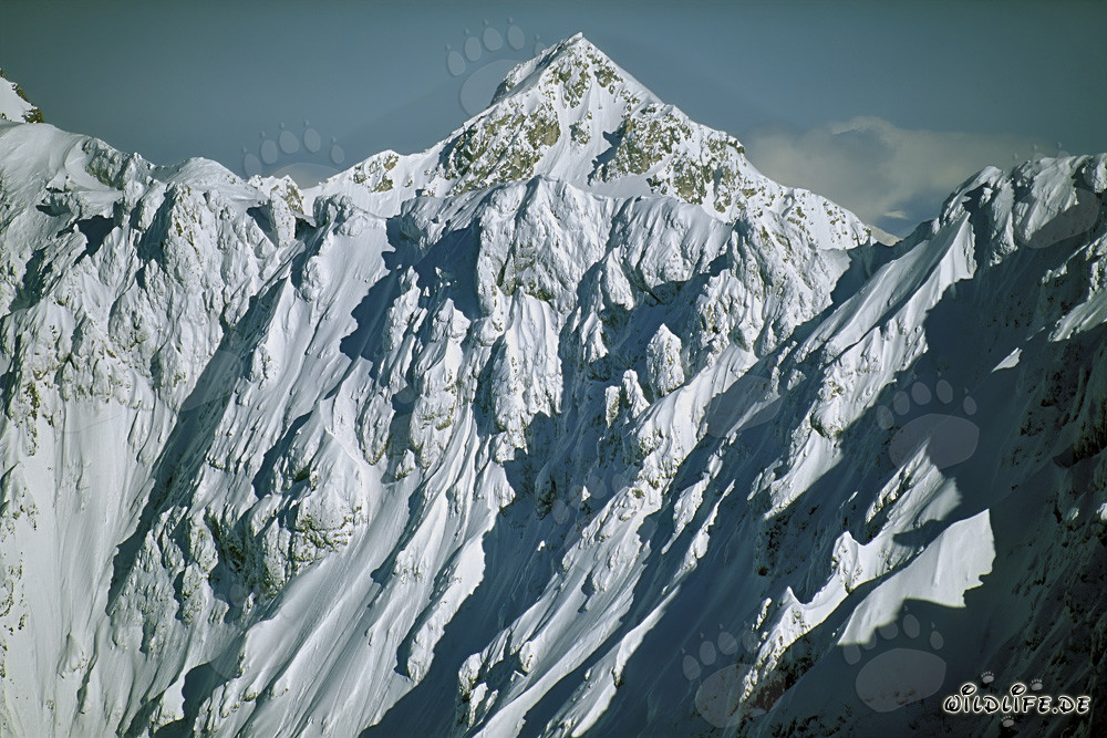 Majestic winter in the Karwendel Mountains with snow-capped peaks and crystal-clear air